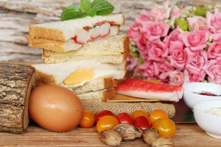 Club sandwich with sauce tomato is delicious