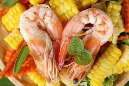 Spicy corn salad with shrimp is deliciousの写真素材