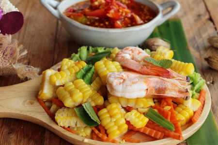 Spicy corn salad with shrimp is deliciousの写真素材
