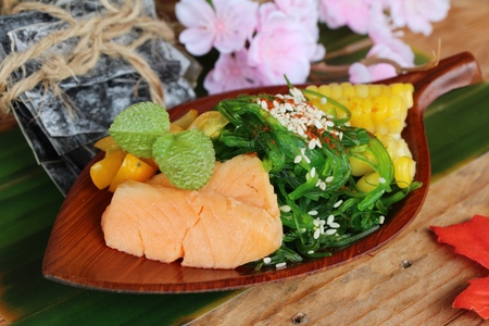Seaweed salad is spicy with salmon deliciousの写真素材