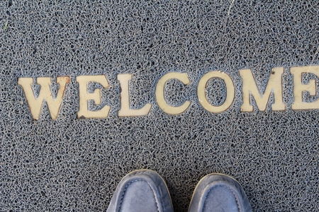 Welcome door mat on background and textureの写真素材