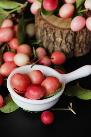 Karonda fruit is delicious on black backgroundの写真素材