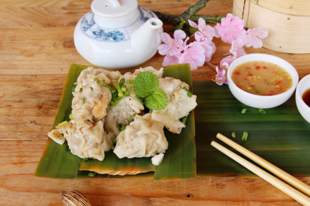 Chinese steamed dumpling with sauce is deliciousの写真素材