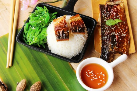 Saba fish rice with sauce and seaweedの写真素材