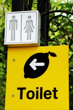Symbolize arrow pointing go to way toiletの写真素材