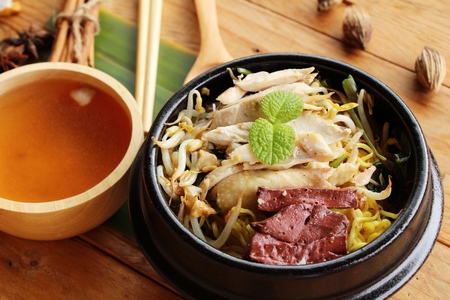 Chicken noodle with vegetable and soup deliciousの写真素材