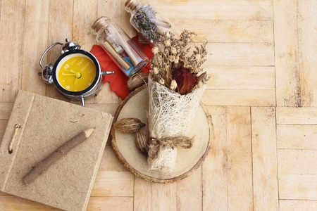 Dried rose flower with clock vintage styleの写真素材