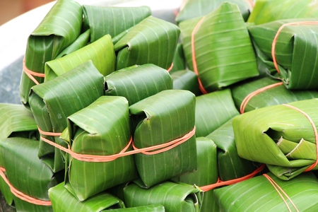 Sour pork wrapped in banana leaves deliciousの写真素材