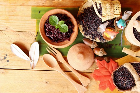 Cook black rice and raw organic riceberry riceの写真素材