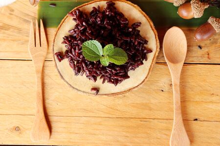 Cook black rice and raw organic riceberry riceの写真素材