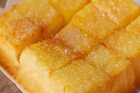 Bread toast with butter and sugar deliciousの写真素材
