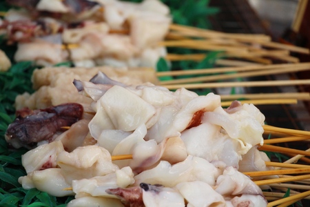 Grilled squid is delicious in the marketの写真素材