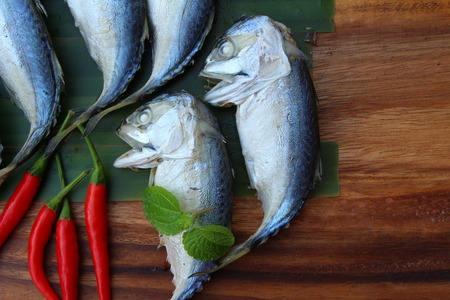 Mackerel fish steamed delicious on wood backgroundの写真素材