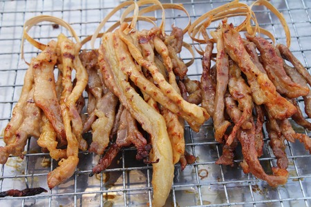 Roasted pork is delicious in the marketの写真素材