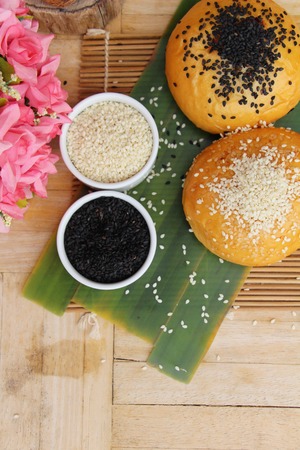 Bread bun with sesame and poppy seedsの写真素材