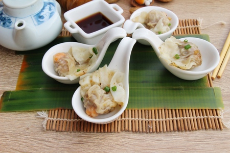 Chinese steamed dumpling with sauce is deliciousの写真素材