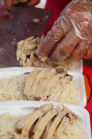 Rice steamed with chicken and sauce deliciousの写真素材