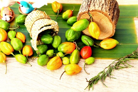 chilli peppers for cooking on wood backgroundの写真素材