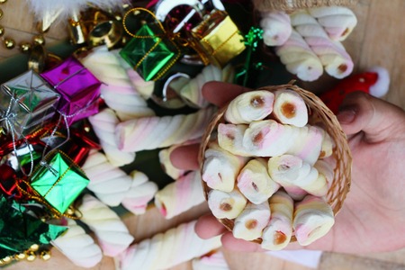 Celebrate christmas decoration with pink sweet marshmallowの写真素材