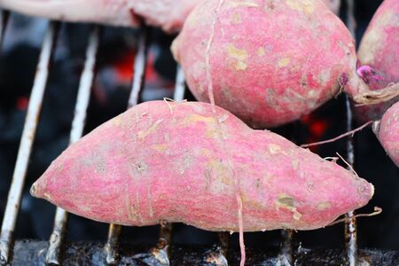 Sweet potatoes grill on stove is deliciousの写真素材