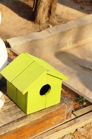 Wooden bird house with the natureの写真素材
