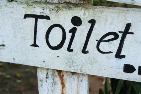 Symbolize arrow pointing go to way toilet