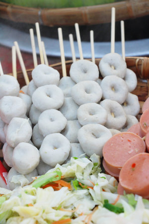 Meatballs and sausages steamed in the market