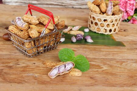 Boiled peanuts is delicious on wood backgroundの写真素材