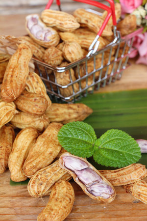 Boiled peanuts is delicious on wood background