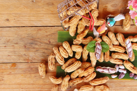 Boiled peanuts is delicious on wood background
