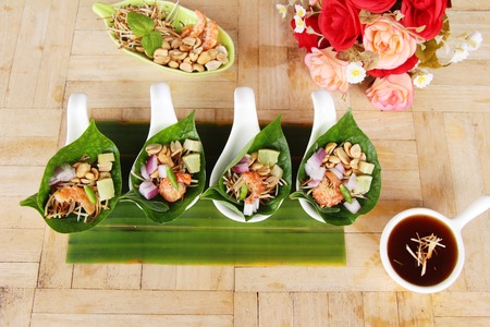 Miang Kham - leaf wrap appetizer is deliciousの写真素材