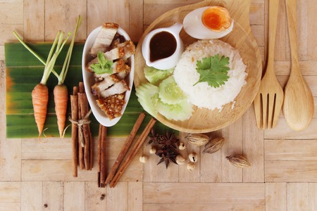 crispy pork with rice delicious on dishの写真素材