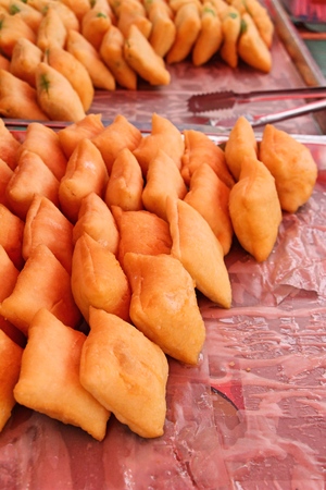 Deep fried dough put sweet condensed milkの写真素材