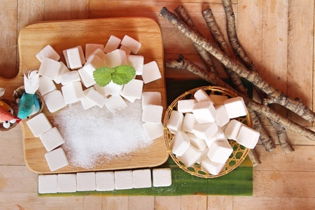 sugar cubes and white sugar for cookingの写真素材