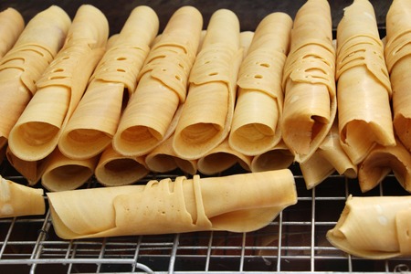 Pancakes roll filled with sausage is deliciousの写真素材