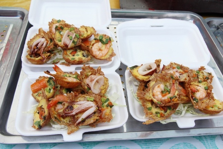 Fried seafood crispy with omelet is deliciousの写真素材