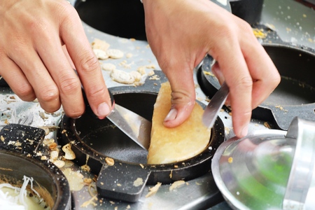 Making crispy pancake delicious at street foodの写真素材