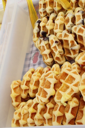 Waffles topped with honey, raisins at street foodの写真素材