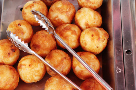 Takoyaki is delicious Japanese food on pan