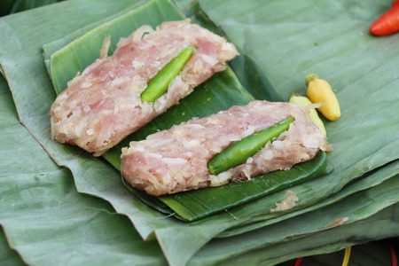 Sour pork wrapped in banana leaves deliciousの写真素材