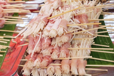 Bacon wrapped mushrooms delicious at street foodの写真素材