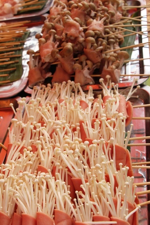 Bacon wrapped mushrooms delicious at street foodの写真素材