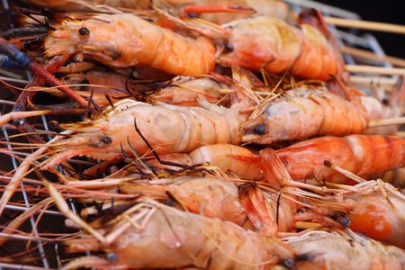 Grilled shrimp is delicious at street foodの写真素材