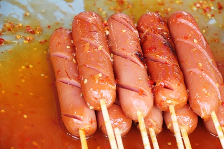 Fried sausage is delicious at street foodの写真素材
