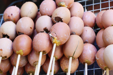 Grilled eggs is delicious in street foodの写真素材