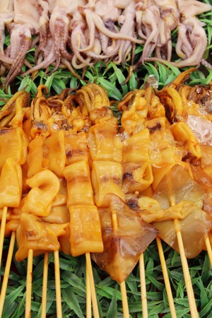 Grilled squid is delicious at street foodの写真素材