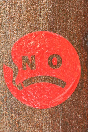 No smoking sign on the wall backgroundの写真素材
