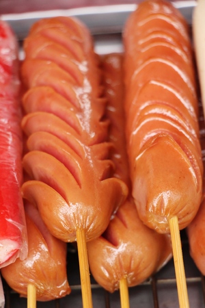 Fried sausage is delicious at street foodの写真素材