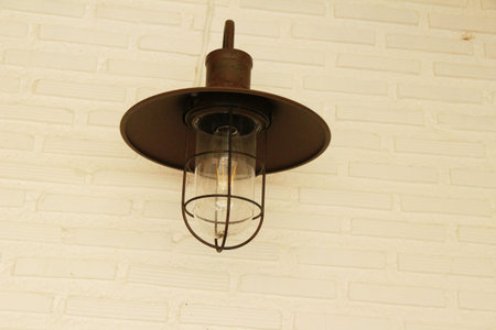 Lamp beside the brick wall vintage style