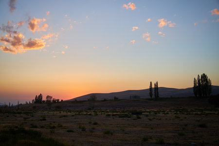 Pink and yellow sunset, rural natural landscapeの写真素材